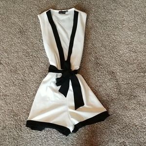 Prettylittlething plunged neck romper NWOT